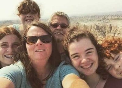 In picture, Kyle Harrison Breitkopf poses with his parents and elder sisters.